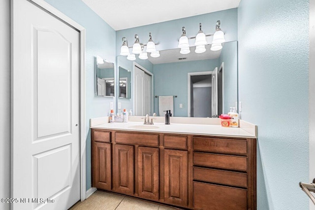 11598 Wynnfield Lakes Cir, Jacksonville, FL 32246 - bathroom with vanity and tile patterned floors