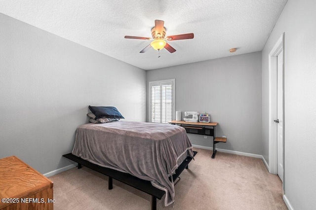 11598 Wynnfield Lakes Cir, Jacksonville, FL 32246 - bedroom featuring light colored carpet, a textured ceiling, and ceiling fan