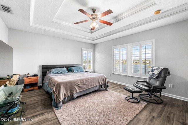 11598 Wynnfield Lakes Cir, Jacksonville, FL 32246 - bedroom featuring a raised ceiling, wood finished floors, crown molding, and ceiling fan
