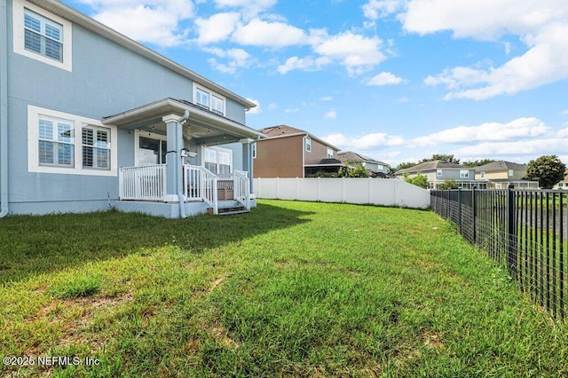 11598 Wynnfield Lakes Cir, Jacksonville, FL 32246 - fenced backyard with covered porch