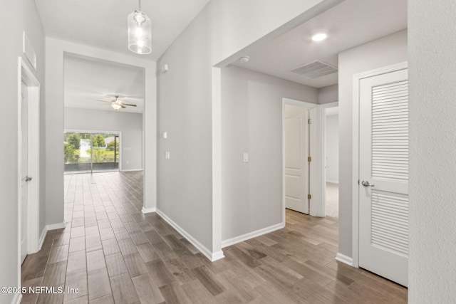 83687 Nether St, Fernandina Beach, FL 32034 - hallway with dark wood-type flooring