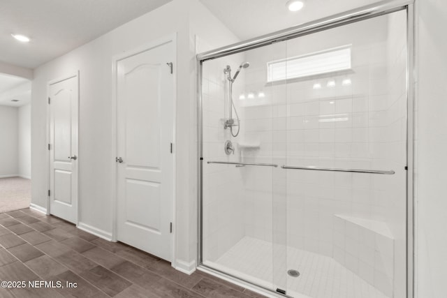 83687 Nether St, Fernandina Beach, FL 32034 - full bathroom with a shower stall, recessed lighting, and wood finished floors