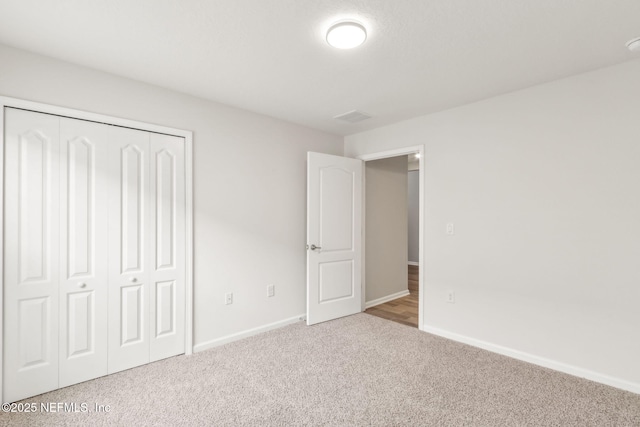 83687 Nether St, Fernandina Beach, FL 32034 - unfurnished bedroom featuring carpet and a closet