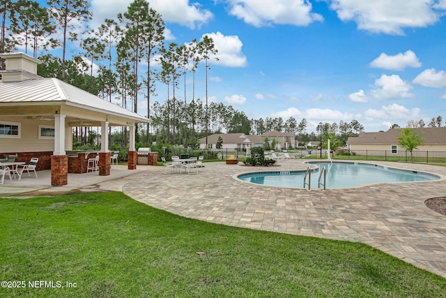 83687 Nether St, Fernandina Beach, FL 32034 - community pool featuring a patio and a ceiling fan