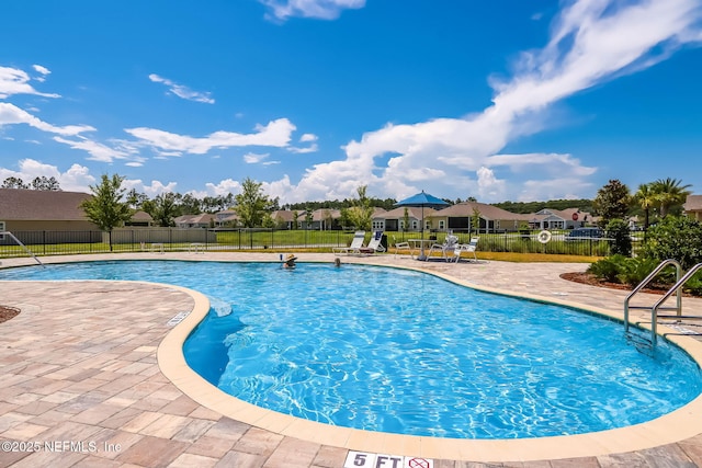 83687 Nether St, Fernandina Beach, FL 32034 - community pool featuring a patio and a residential view