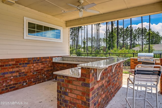 83687 Nether St, Fernandina Beach, FL 32034 - view of patio featuring an outdoor kitchen and ceiling fan