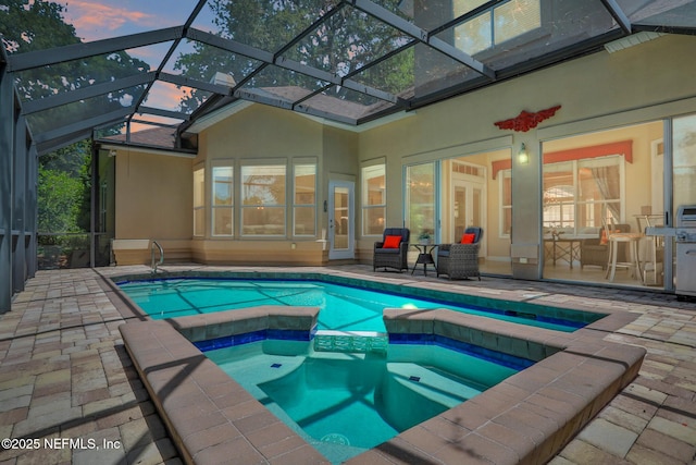 1521 Nottingham Knoll Dr, Jacksonville, FL 32225 - view of swimming pool with a patio, a pool with connected hot tub, and a lanai