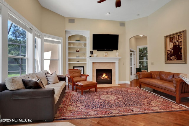1521 Nottingham Knoll Dr, Jacksonville, FL 32225 - living area with ceiling fan, wood finished floors, plenty of natural light, a fireplace with flush hearth, and recessed lighting