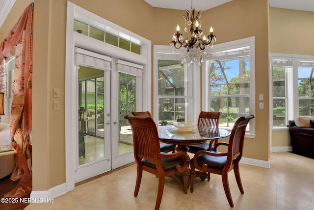 1521 Nottingham Knoll Dr, Jacksonville, FL 32225 - dining area with french doors, plenty of natural light, and a chandelier