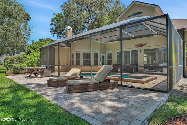 1521 Nottingham Knoll Dr, Jacksonville, FL 32225 - back of house featuring a patio, a lanai, a chimney, and an outdoor pool
