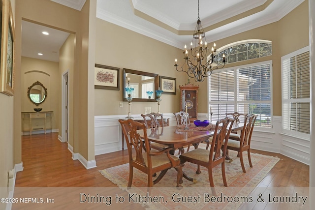1521 Nottingham Knoll Dr, Jacksonville, FL 32225 - dining area featuring ornamental molding, wood finished floors, a chandelier, wainscoting, and recessed lighting