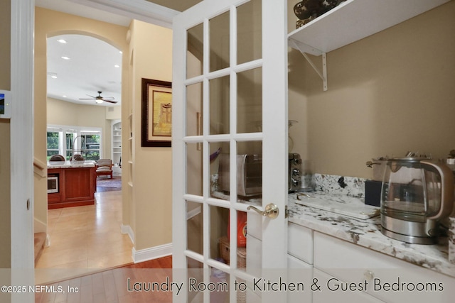 1521 Nottingham Knoll Dr, Jacksonville, FL 32225 - hall featuring arched walkways and recessed lighting