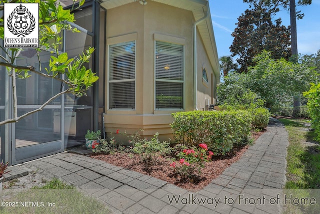 1521 Nottingham Knoll Dr, Jacksonville, FL 32225 - view of side of home with stucco siding