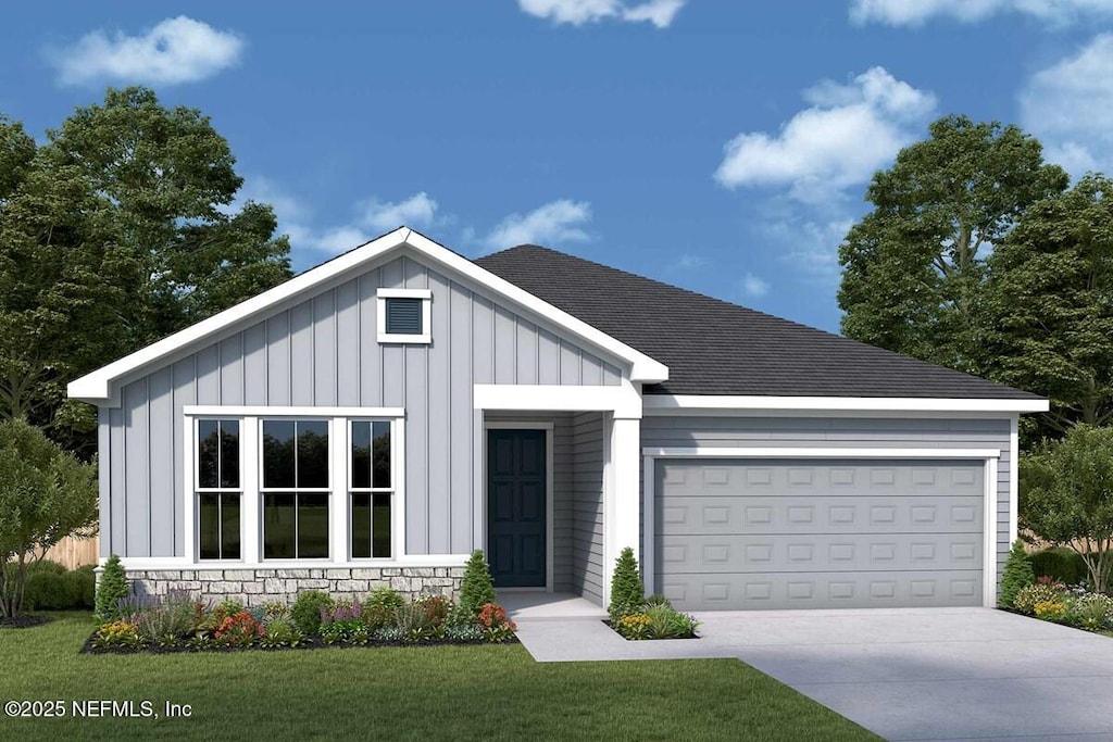 75566 Banyan Way, Yulee, FL 32097 - modern inspired farmhouse featuring board and batten siding, a garage, driveway, and a front lawn