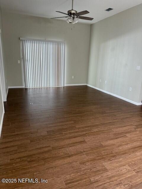 9556 Armelle Way Unit 2, Jacksonville, FL 32257 - unfurnished room with ceiling fan and wood finished floors
