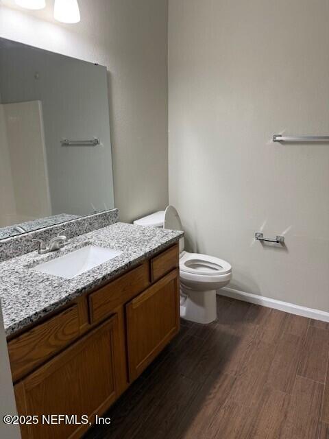9556 Armelle Way Unit 2, Jacksonville, FL 32257 - bathroom featuring wood finished floors and vanity
