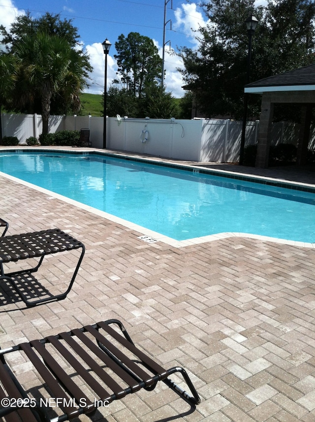 9556 Armelle Way Unit 2, Jacksonville, FL 32257 - view of pool with a patio