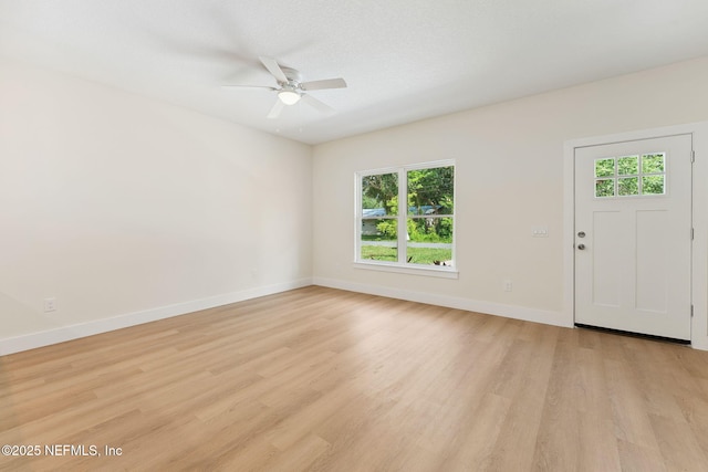 981 Butler Ave, Saint Augustine, FL 32084 - foyer entrance featuring healthy amount of natural light, a ceiling fan, and light wood-style flooring