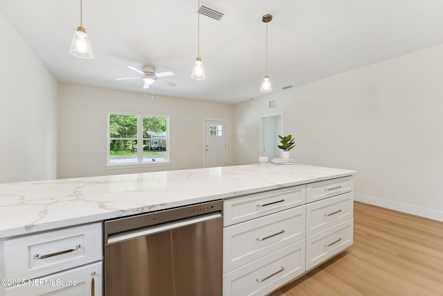 981 Butler Ave, Saint Augustine, FL 32084 - kitchen with stainless steel dishwasher, white cabinets, light wood finished floors, ceiling fan, and pendant lighting