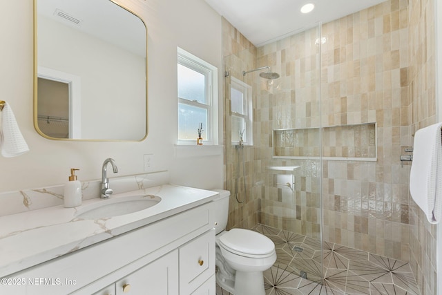 981 Butler Ave, Saint Augustine, FL 32084 - bathroom with vanity, tiled shower, and recessed lighting