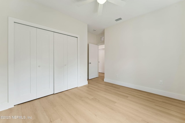 981 Butler Ave, Saint Augustine, FL 32084 - unfurnished bedroom featuring wood finished floors, a closet, and ceiling fan