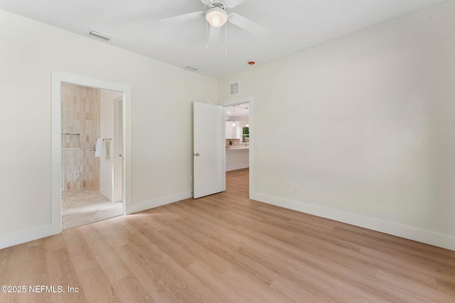 989 Butler Ave, Saint Augustine, FL 32084 - unfurnished bedroom with light wood-style flooring and ensuite bath