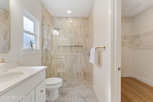 989 Butler Ave, Saint Augustine, FL 32084 - full bathroom featuring a walk in shower, vanity, and a spacious closet