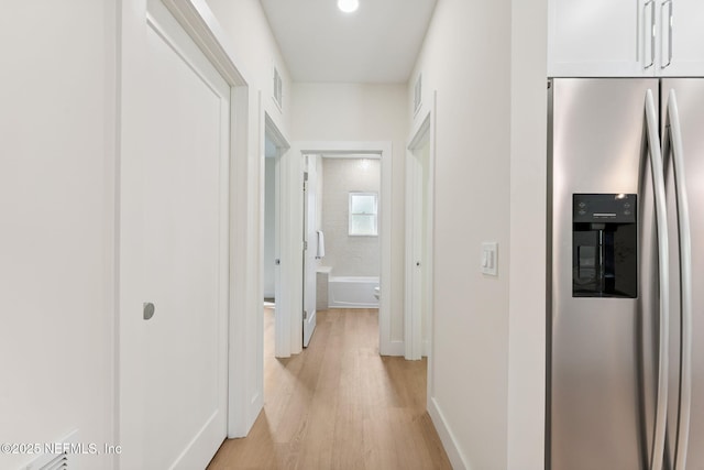 989 Butler Ave, Saint Augustine, FL 32084 - hall with light wood finished floors and baseboards