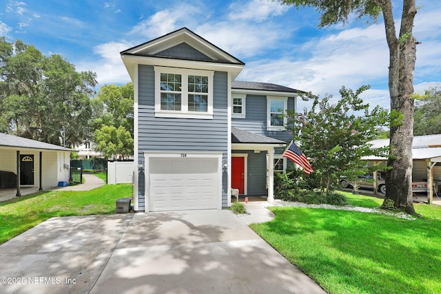 724 N Pine Ave, Green Cove Springs, FL 32043 - view of front of home featuring an attached garage, driveway, and a shingled roof