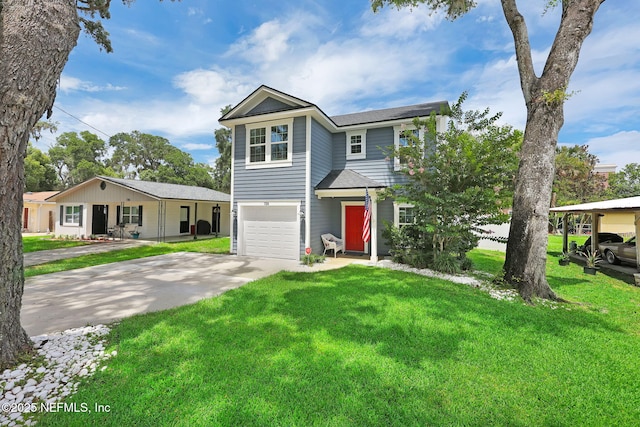 724 N Pine Ave, Green Cove Springs, FL 32043 - view of front of home with a garage, a front lawn, concrete driveway, and roof with shingles