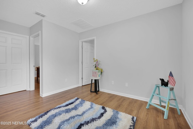 724 N Pine Ave, Green Cove Springs, FL 32043 - bedroom featuring wood finished floors and baseboards