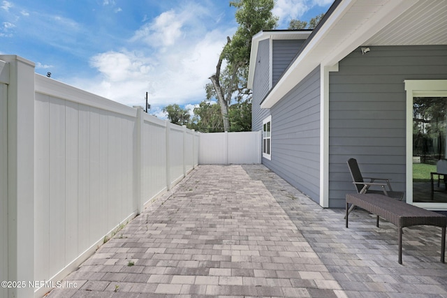 724 N Pine Ave, Green Cove Springs, FL 32043 - fenced backyard with a patio