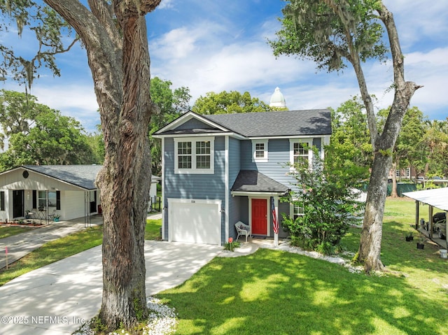 724 N Pine Ave, Green Cove Springs, FL 32043 - traditional home with roof with shingles, a garage, concrete driveway, and a front lawn