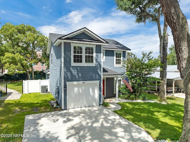724 N Pine Ave, Green Cove Springs, FL 32043 - traditional-style home with driveway, a shingled roof, and an attached garage
