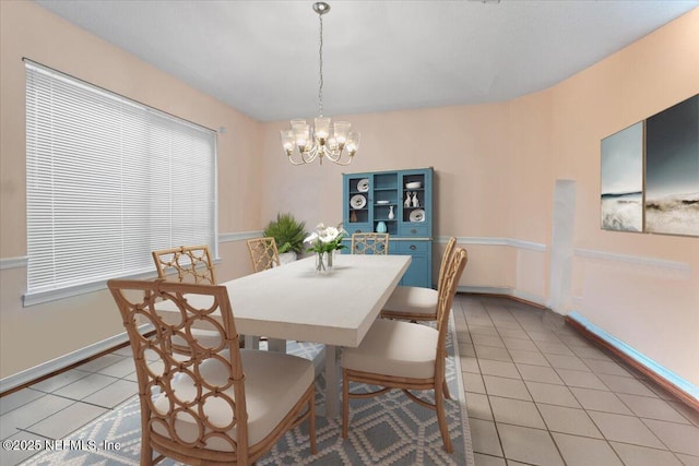 1121 Linkside Ct E, Atlantic Beach, FL 32233 - dining area featuring a chandelier and light tile patterned floors