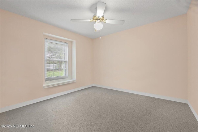 1121 Linkside Ct E, Atlantic Beach, FL 32233 - spare room featuring carpet floors and ceiling fan