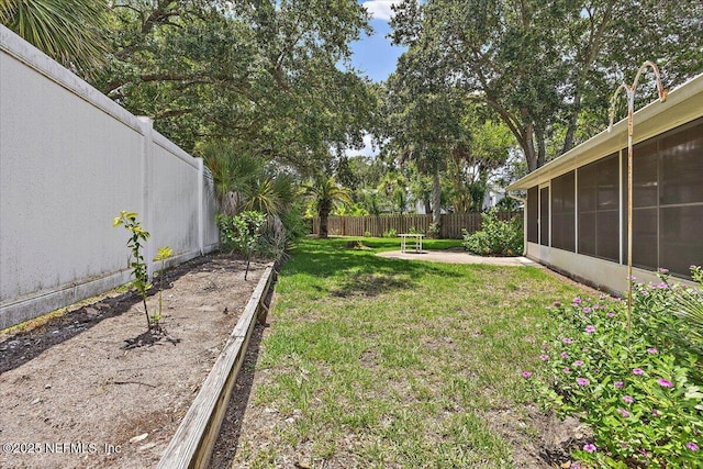 1121 Linkside Ct E, Atlantic Beach, FL 32233 - fenced backyard featuring a sunroom and a patio