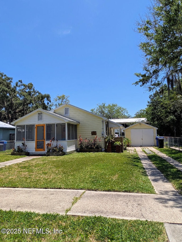 217 Covino Ave, Saint Augustine, FL 32084 - view of front of home with a sunroom and driveway