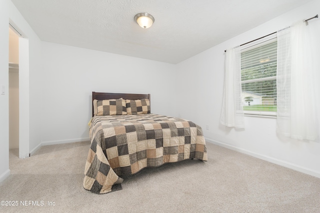 175 Evergreen Ln, Middleburg, FL 32068 - bedroom featuring carpet and a textured ceiling
