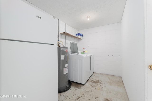 175 Evergreen Ln, Middleburg, FL 32068 - laundry room featuring independent washer and dryer, water heater, and concrete block wall