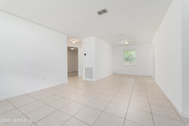 175 Evergreen Ln, Middleburg, FL 32068 - unfurnished room featuring light tile patterned floors and baseboards