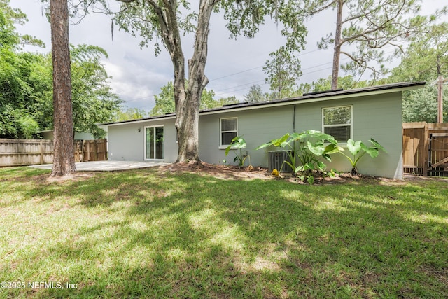 175 Evergreen Ln, Middleburg, FL 32068 - back of property featuring a patio area and concrete block siding