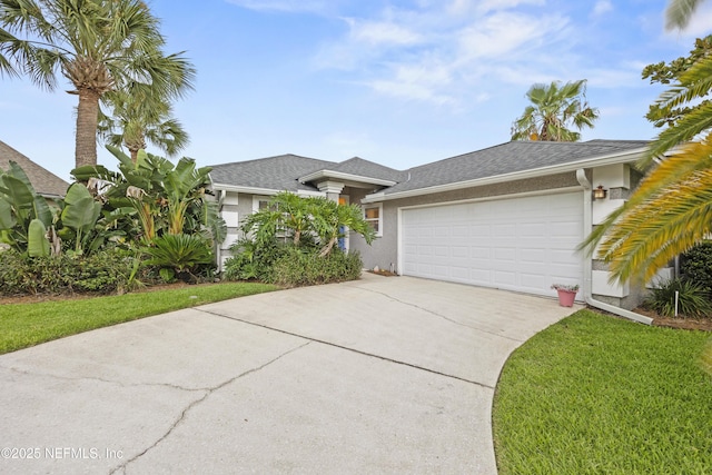1419 Linkside Dr, Atlantic Beach, FL 32233 - single story home with concrete driveway, a garage, stucco siding, a front lawn, and roof with shingles