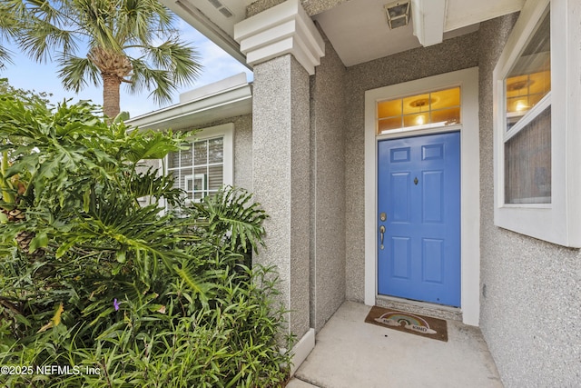 1419 Linkside Dr, Atlantic Beach, FL 32233 - view of exterior entry with stucco siding