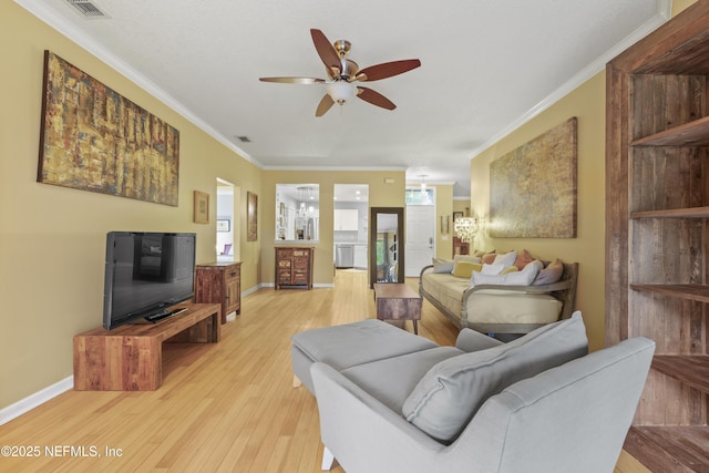 1419 Linkside Dr, Atlantic Beach, FL 32233 - living room featuring a ceiling fan, crown molding, and light wood-type flooring