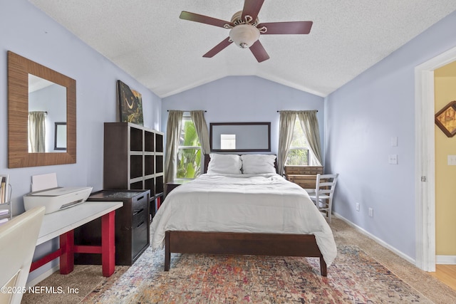 1419 Linkside Dr, Atlantic Beach, FL 32233 - bedroom featuring a textured ceiling, lofted ceiling, and ceiling fan