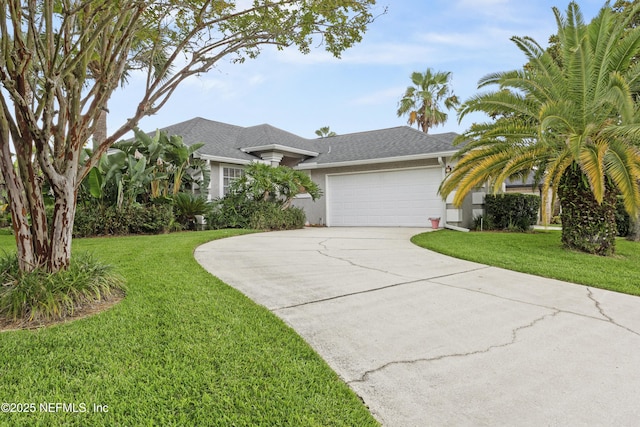 1419 Linkside Dr, Atlantic Beach, FL 32233 - view of front of house with an attached garage, concrete driveway, a front lawn, stucco siding, and roof with shingles