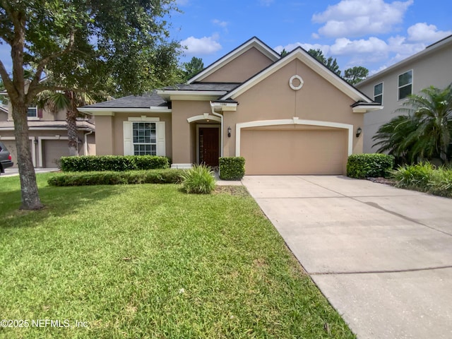 1090 Lauriston Dr, Saint Johns, FL 32259 - view of front of property featuring stucco siding, a front lawn, a garage, and driveway