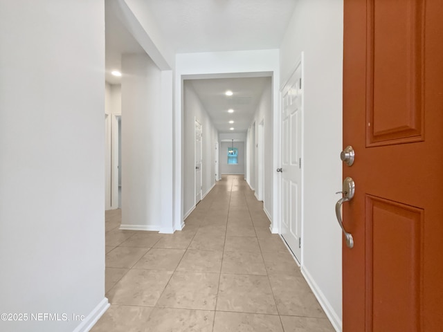 1090 Lauriston Dr, Saint Johns, FL 32259 - hall with light tile patterned floors and baseboards