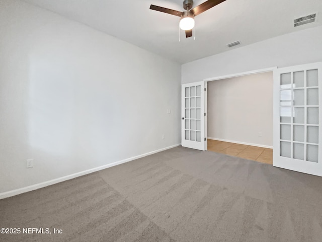 1090 Lauriston Dr, Saint Johns, FL 32259 - carpeted spare room with french doors and a ceiling fan